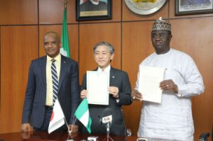 L-R: Honorable Minister of State Federal Ministry of Budget and National Planning, Prince Clem Agba; Ambassador Extraordinary and Plenipotentiary of Japan to Nigeria, His Excellency Kazuyoshi Matsunaga and Director General, Nigerian Maritime Administration and Safety Agency (NIMASA), Dr. Bashir Jamoh during the signing of an Exchange of Note (E/N) with the Japanese Government for the Economic and Social Development Programme in Abuja.