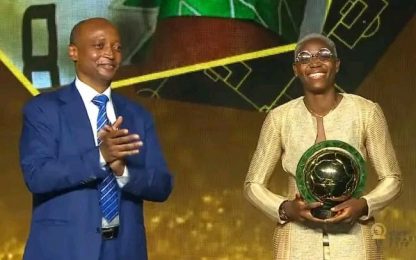 Asisat Oshoala receiving the CAF player of the year award for the fifth time in Rabat, Morocco