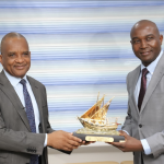 Director General, Nigerian Maritime Administration and Safety Agency (NIMASA), Dr. Bashir Jamoh presenting a souvenir to the Managing Director/CEO, Nigeria LNG Limited, Dr. Philip Mshelbila during a courtesy visit at the NIMASA headquarters in Lagos.