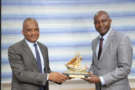 Director General, Nigerian Maritime Administration and Safety Agency (NIMASA), Dr. Bashir Jamoh presenting a souvenir to the Managing Director/CEO, Nigeria LNG Limited, Dr. Philip Mshelbila during a courtesy visit at the NIMASA headquarters in Lagos.