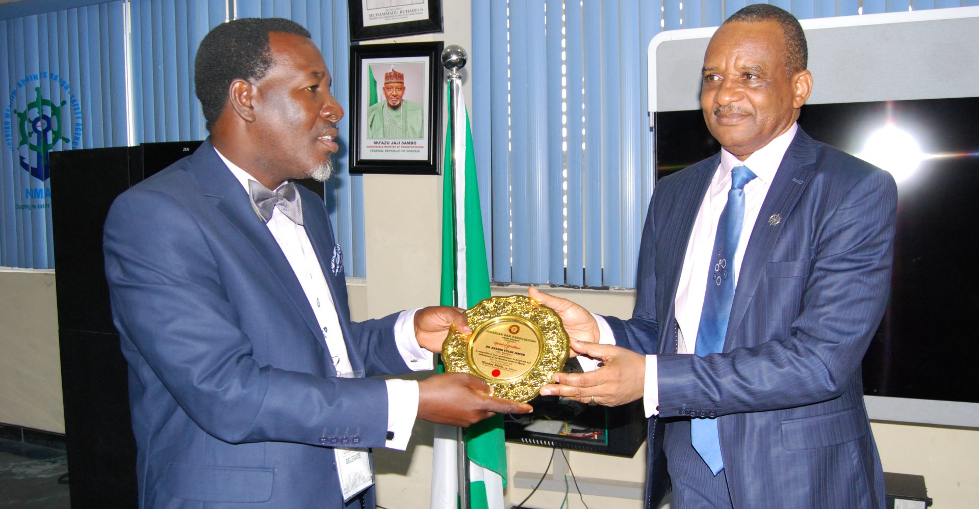 Director General, Nigerian Maritime Administration and Safety Agency (NIMASA), Dr Bashir Jamoh (right) receiving a souvenir from a branch Chairman of the Nigerian Bar Association (NBA) from the Federal Capital Territory (FCT) Abuja, Mr Adjeh Monday during a courtesy visit by the association to the NIMASA headquarters in Lagos