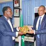 Director General, Nigerian Maritime Administration and Safety Agency (NIMASA), Dr Bashir Jamoh (right) receiving a souvenir from a branch Chairman of the Nigerian Bar Association (NBA) from the Federal Capital Territory (FCT) Abuja, Mr Adjeh Monday during a courtesy visit by the association to the NIMASA headquarters in Lagos