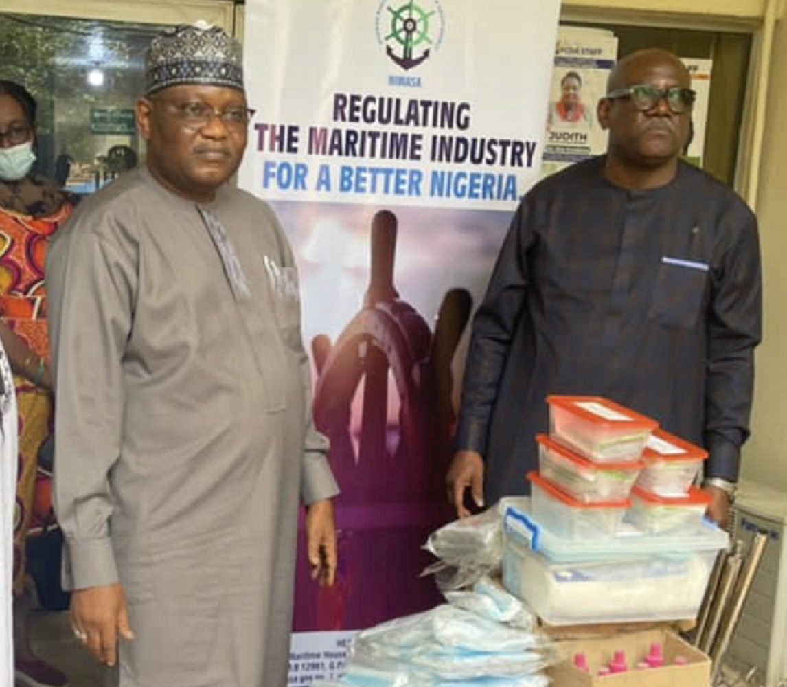 Director, Special Duties of the Nigerian Maritime Administration and Safety Agency (NIMASA), Mr Isichei Osamgbi (right) and Executive Secretary of the FCT Emergency Management Agency (FEMA), Alhaji Abbass Idriss during the donation of medical equipments by NIMASA to hospitals in Abuja.