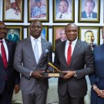UBA New Executives at NGX 2: l-r: Deputy Managing Director, United Bank for Africa(UBA) Plc, Mr. Muyiwa Akinyemi; Chief Executive Officer, Nigerian Exchange (NGX) Ltd , Mr. Temi Popoola and Group Managing Director/CEO, United Bank for Africa(UBA) Plc, Mr Oliver Alawuba; and Director, Nigerian Exchange (NGX) Ltd , Erelu Angela Adebayo, during the ceremonial strike of the closing gong at the floor of the Exchange by Alawuba in honour of recently appointed UBA’s executive management, on Wednesday in Lagos