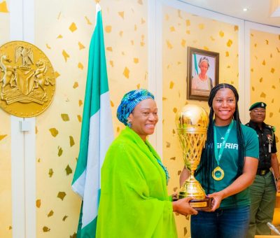 Nigerian First Lady Gives D’Tigress Presidential Handshake